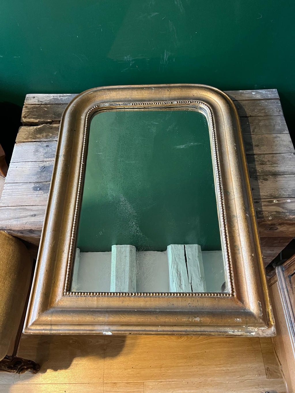 La Ferme Anglaise antique French Louis Philippe gilt mirror with a warm bronze-gold frame and beaded border detail.