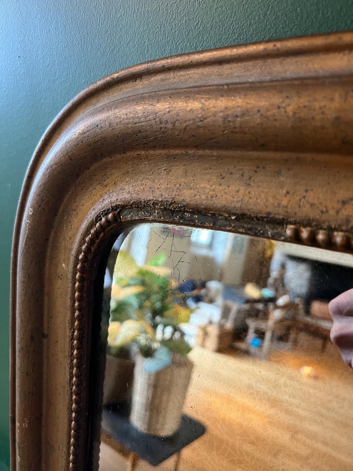 La Ferme Anglaise antique French Louis Philippe gilt mirror with warm bronze-gold frame and beaded border detail