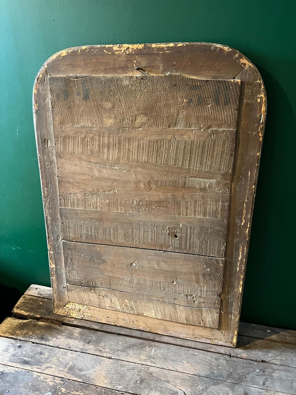 Back view of an antique La Ferme Anglaise French Louis Philippe mirror showing original weathered wooden backboards