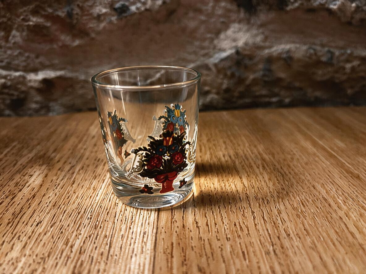 La Ferme Anglaise vintage glass liqueur shot glass with colourful enamelled folk art flower basket design