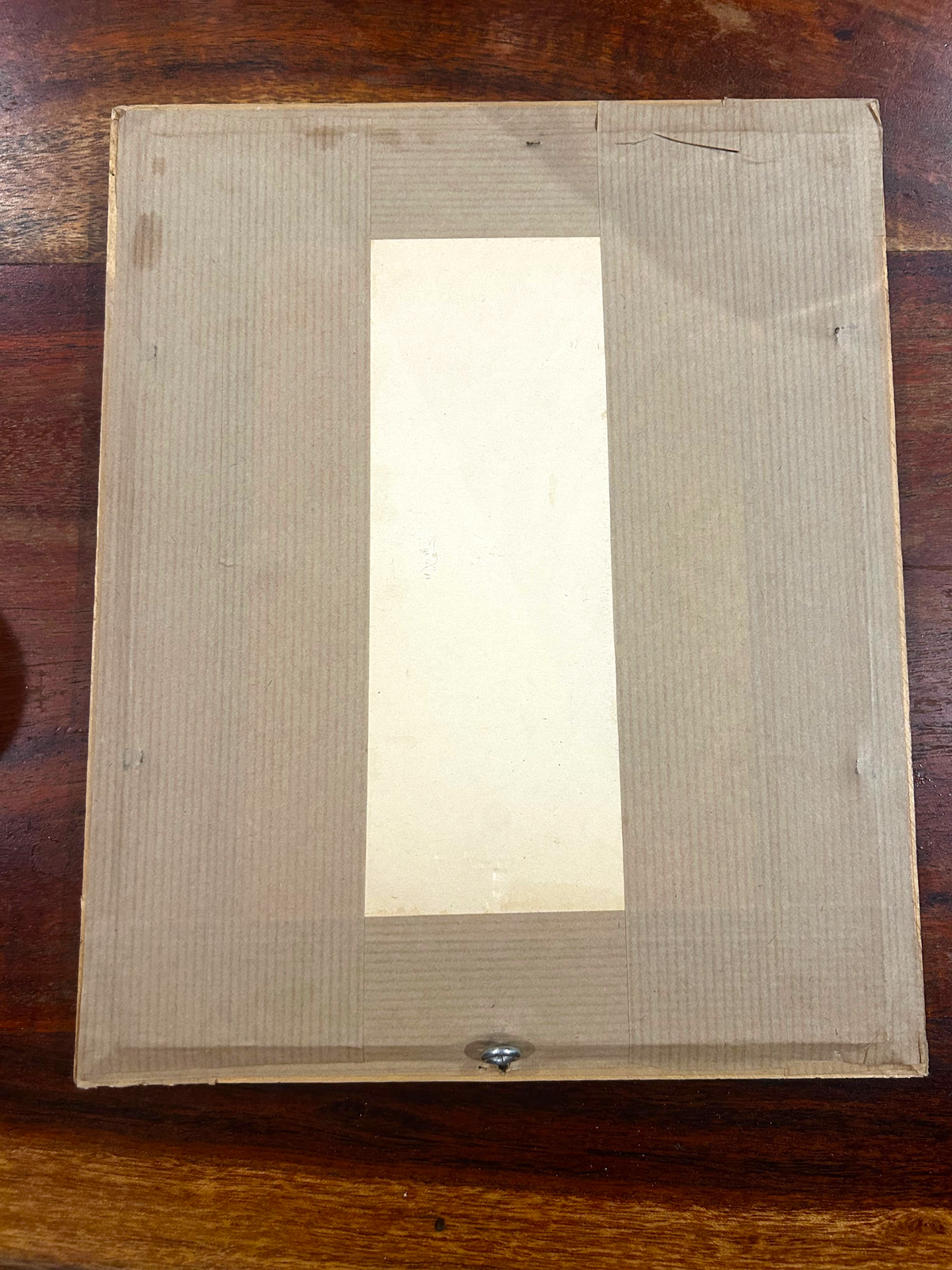 Back view of a La Ferme Anglaise framed vintage French hot air balloon print showing brown paper backing and hanger.