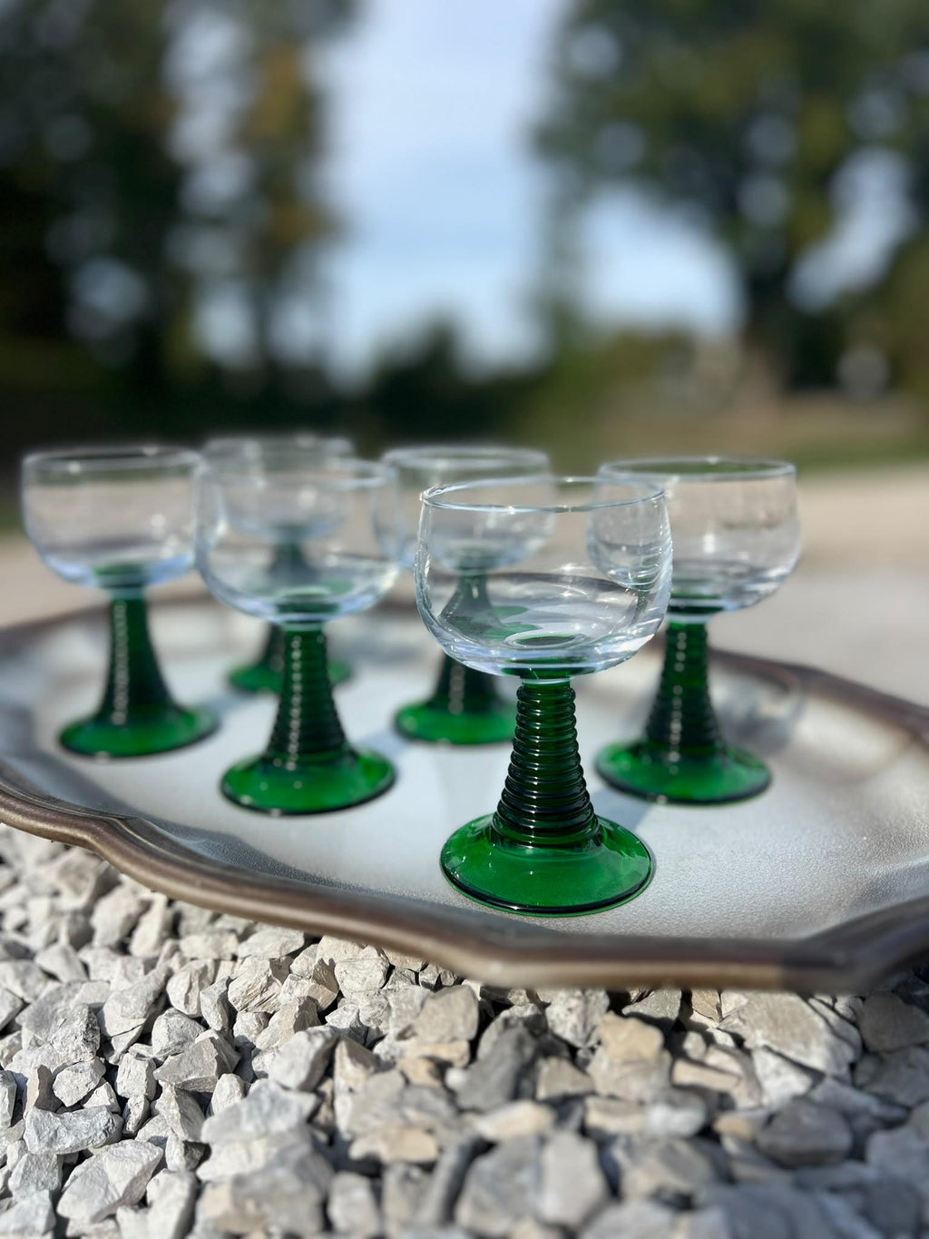 La Ferme Anglaise set of six vintage French bistro wine glasses with clear bowls and ribbed green glass stems.