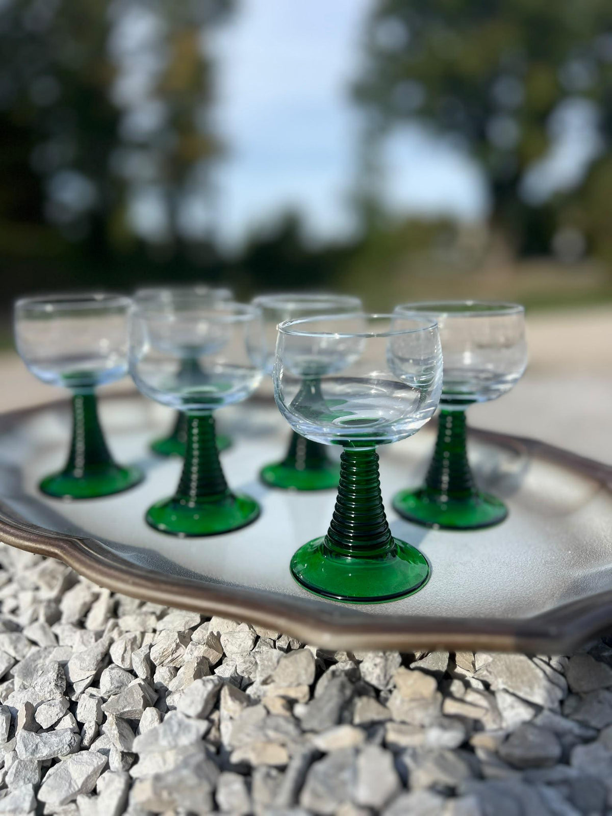La Ferme Anglaise set of six vintage French bistro wine glasses with clear bowls and ribbed green glass stems.
