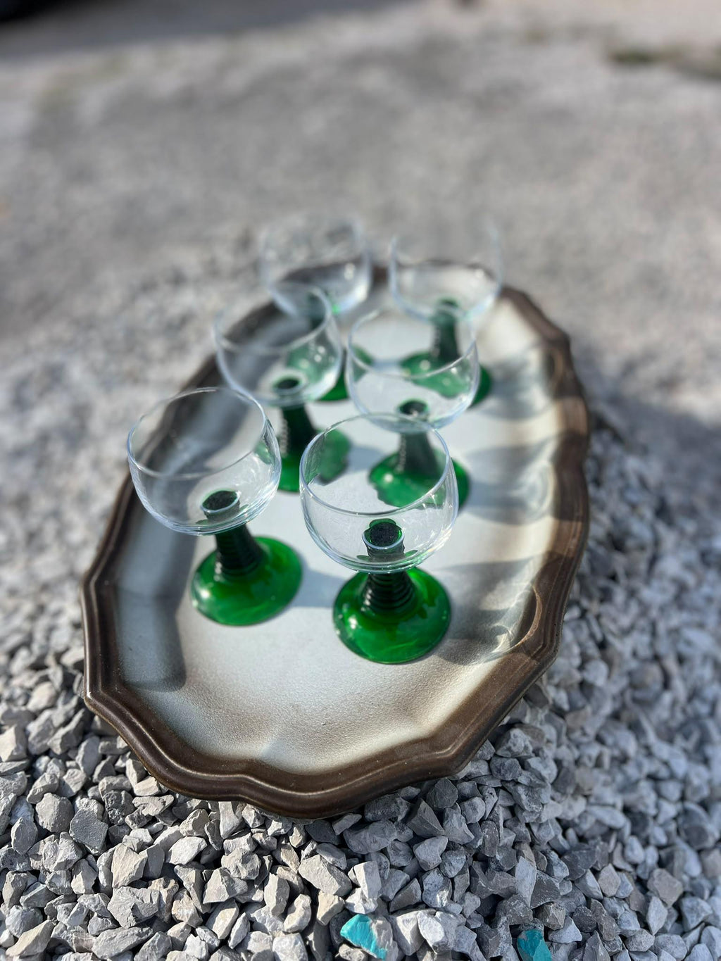 La Ferme Anglaise set of six vintage French bistro wine glasses with clear bowls and vibrant green stems on a tray