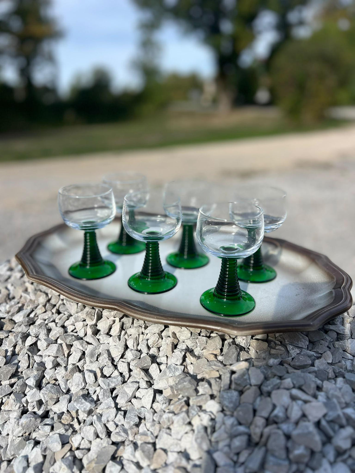 La Ferme Anglaise set of six vintage French bistro wine glasses with clear bowls and ribbed green glass stems.