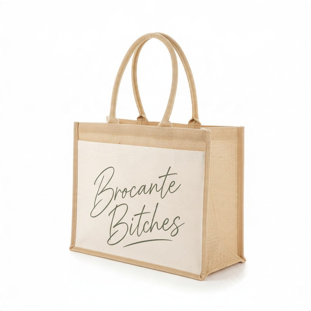 La Ferme Anglaise jute shopper tote with a cotton canvas front pocket featuring Brocante Bitches script text