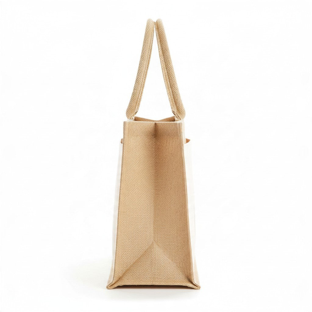 La Ferme Anglaise laminated jute shopper bag with cotton canvas side panel and sturdy carry handles, side view