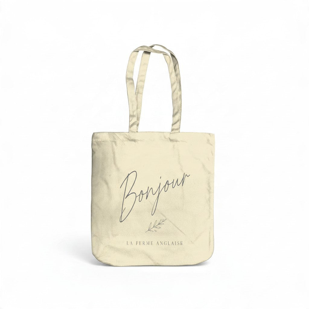 La Ferme Anglaise Bonjour organic brushed cotton canvas tote bag in natural beige with long shoulder straps.