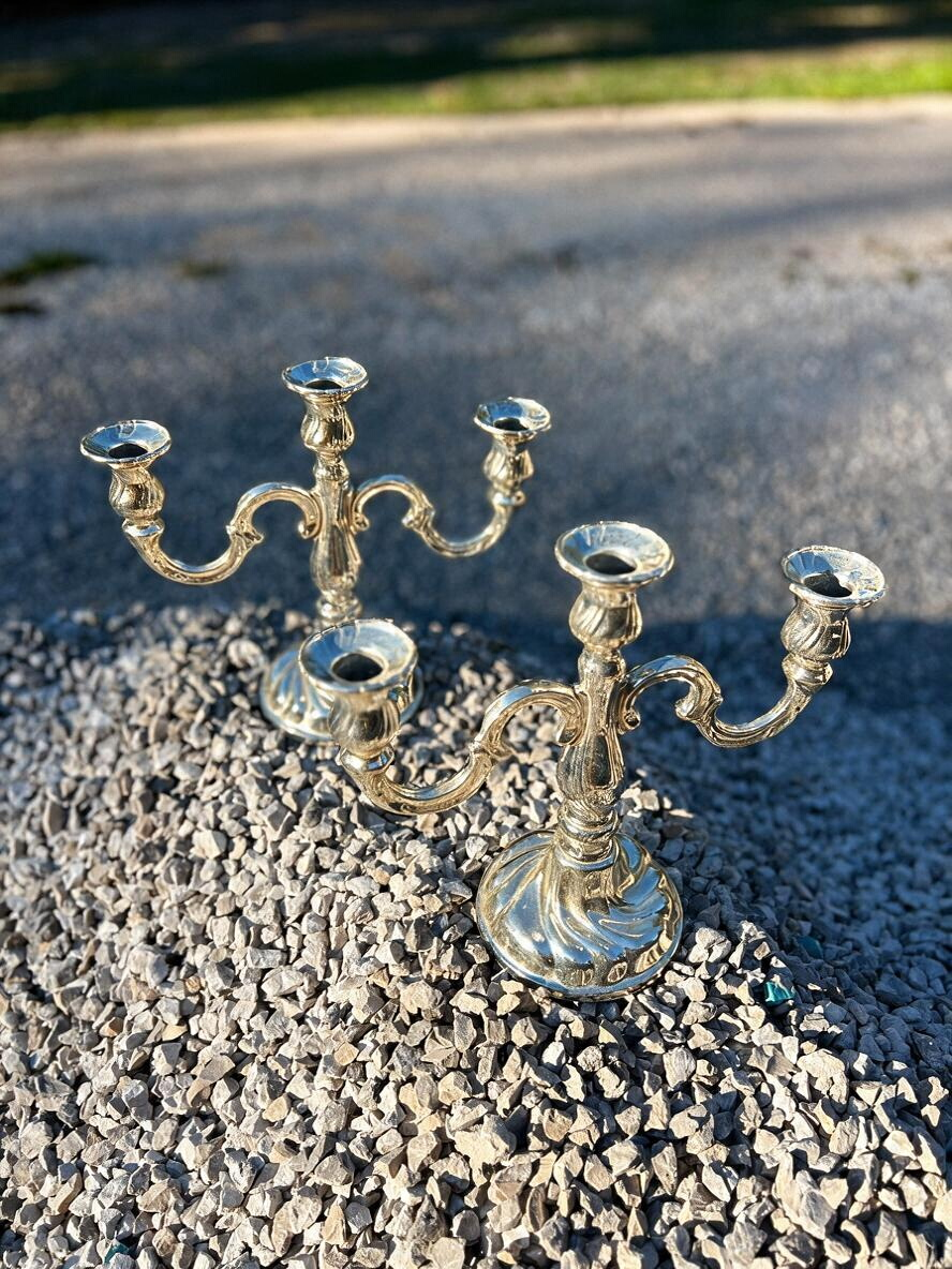 La Ferme Anglaise pair of ornate gold-tone metal 3-arm candelabra with scrolling arms and decorative bases