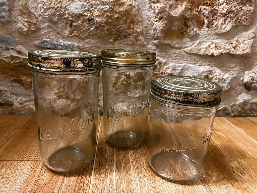 La Ferme Anglaise set of three vintage French glass storage jars with embossed Vereco and Familia Wiss metal lids.